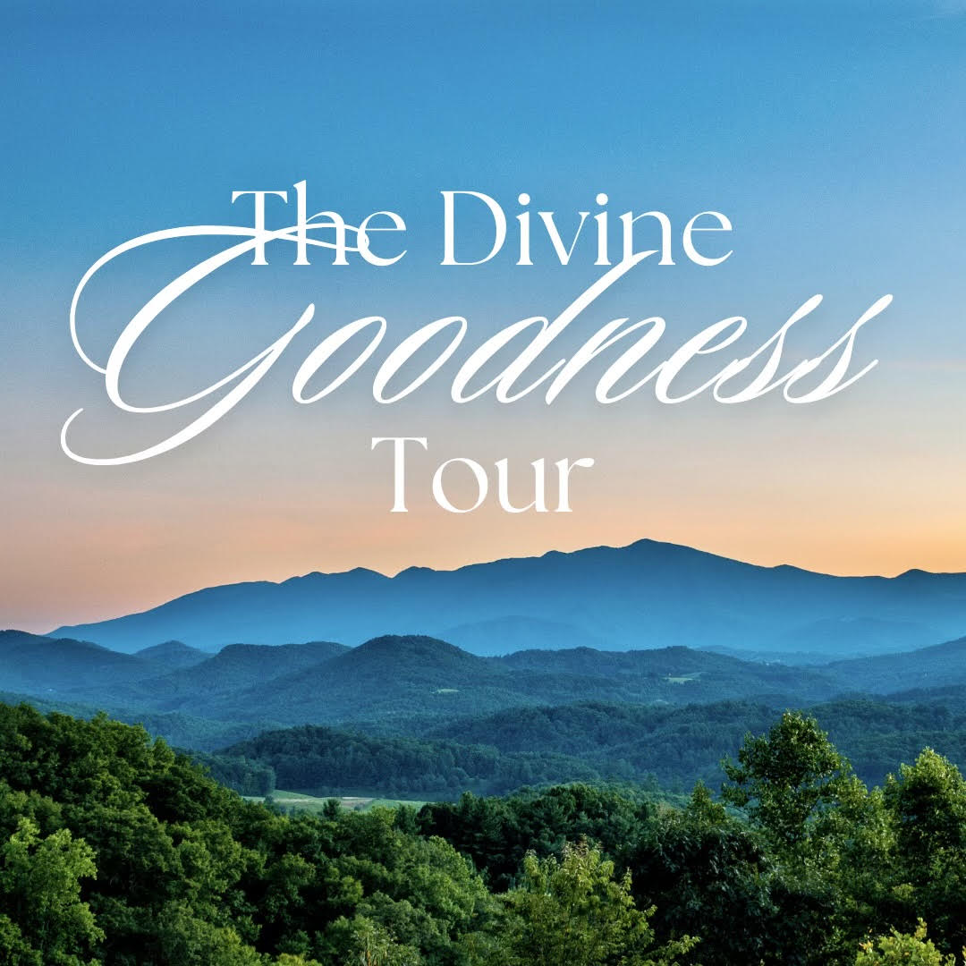 The Divine Goodness Tour above mountains and forest